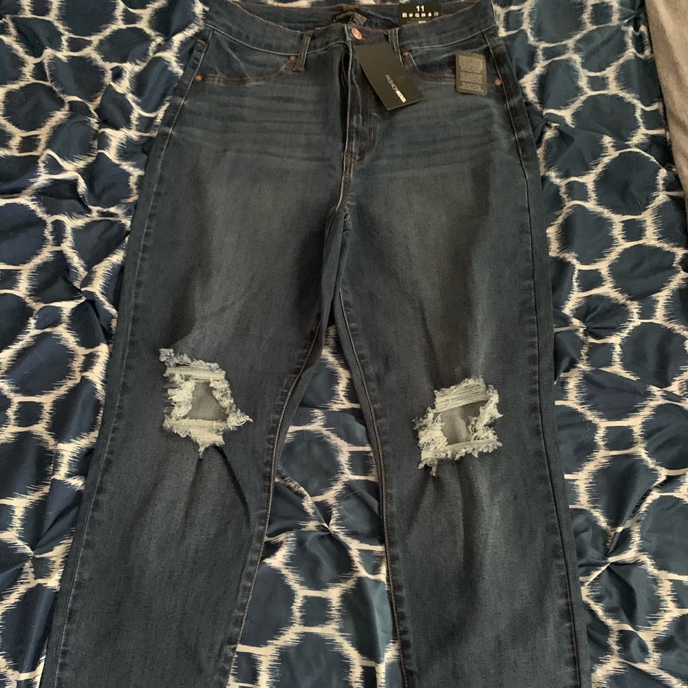 Brand new Fashion Nova shredded knee jeans